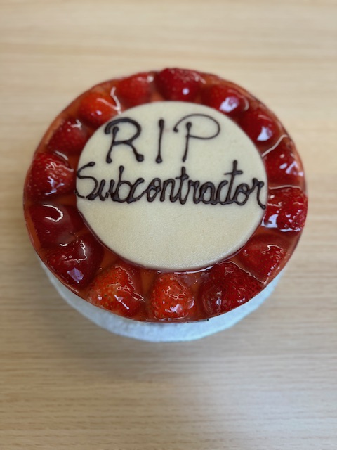 A cake with the message RIP Subcontractor written on it.